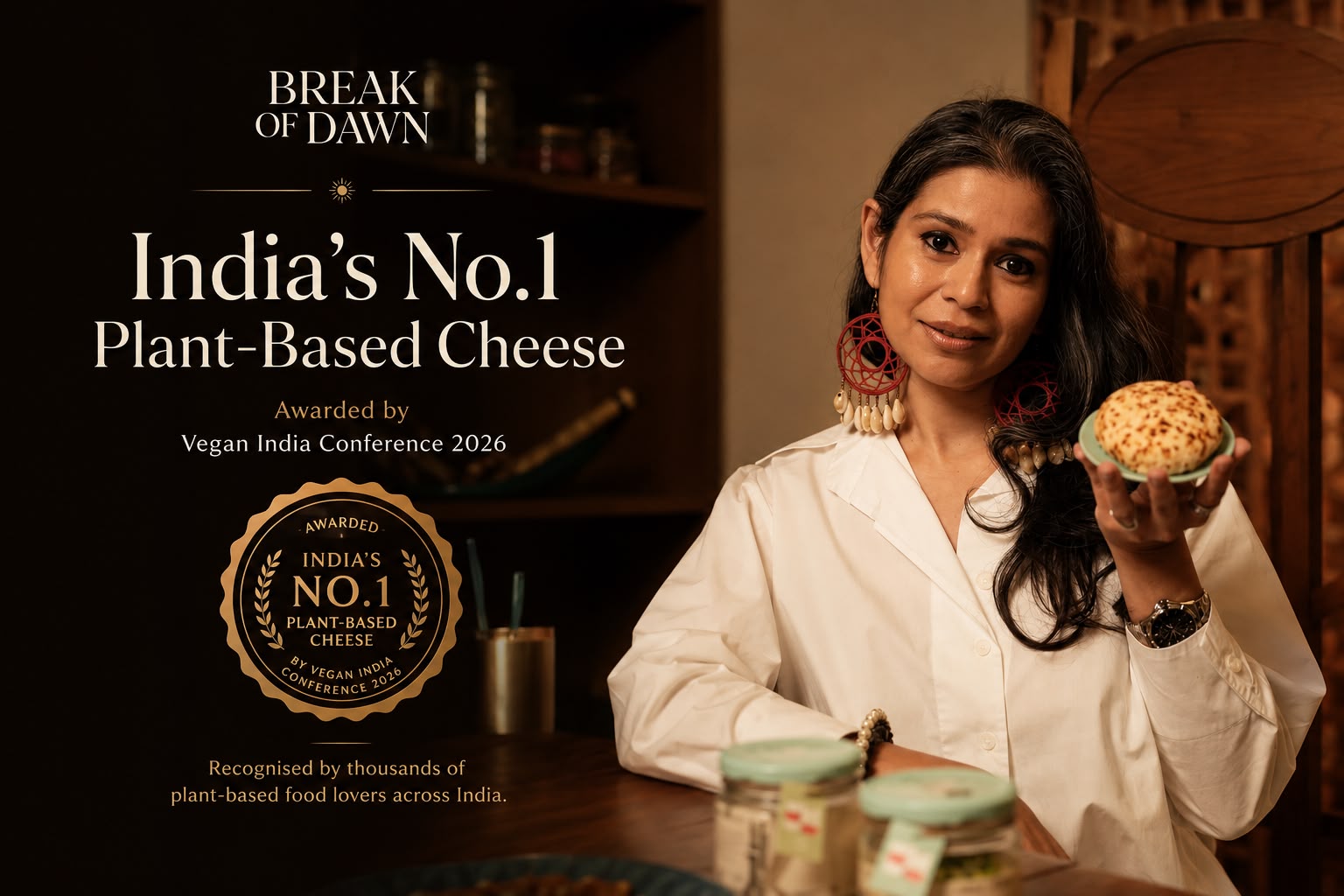 Pardita with the India's No.1 Plant-Based Cheese award, holding a wheel of Break of Dawn cheese