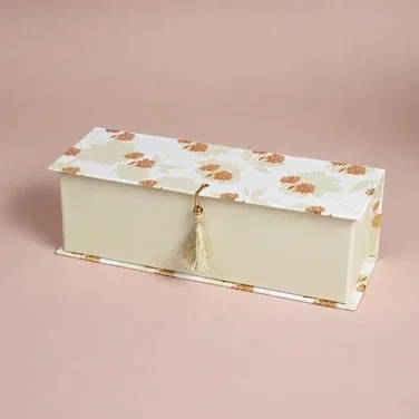 A long three-section floral paper gift box
