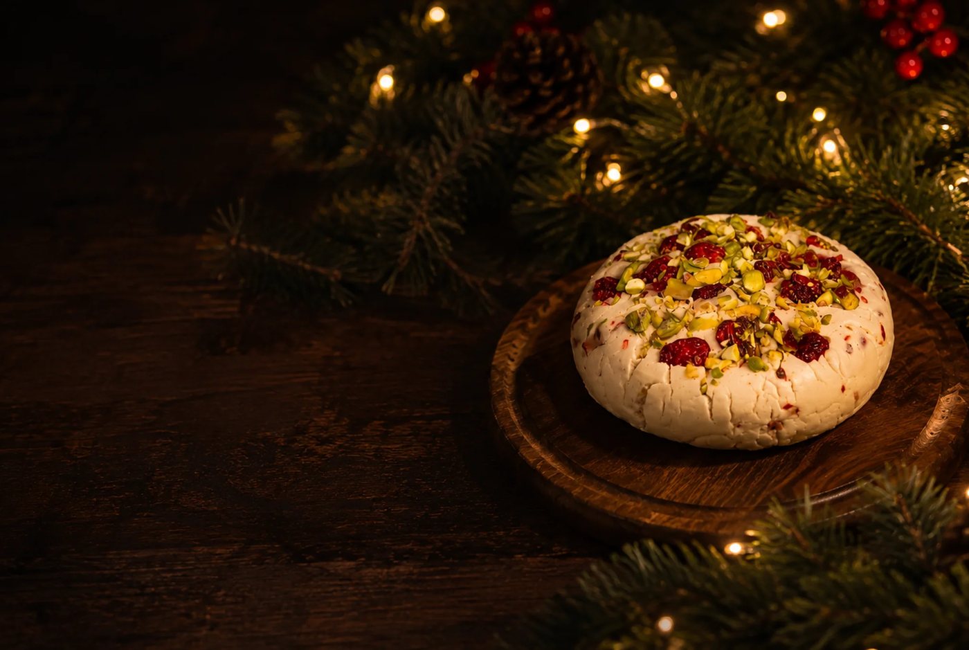 Break of Dawn cranberry and pistachio almond feta on a wooden board
