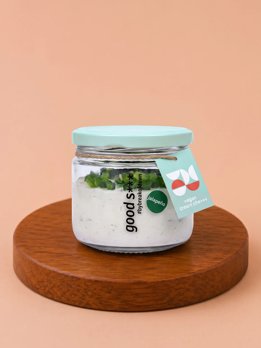 A tub of Break of Dawn jalapeño cream cheese, a plant-based cream cheese